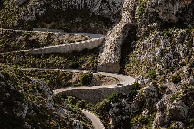 mallorca, winding road, mountains, nature, landscape, road, mallorca, mallorca, mallorca, mallorca, mallorca, winding road, winding road, winding road, winding road, road, road. How seasons shape access on a slow road trip