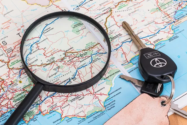 map, vacation, travel, driving, holiday, car keys, magnifying glass, trip, summer, journey, tourism, nature, adventure, leisure, tourist, road, drive, transport, route, way, street. How to Plan a Slow Road Trip on the Lincoln Highway Without Missing the Old Alignments